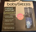 Baby Brezza Instant Formula Warmer Advanced Bottles With Night Light. Fixed Price $27.00.